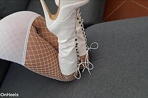 perfect-assed milf wears high-heeled boots and fishnet stockings