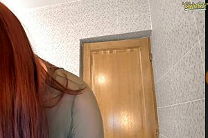 Redhead with big tits intensely plays with huge dildo on webcam