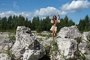 Do you enjoy this topless dance in the white stone quarry?