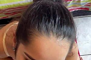 Young woman Debora Prado performing oral on large penis deeply and sloppily