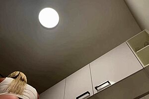 hot sexy natural big tits braless wife goes no panties in the kitchen