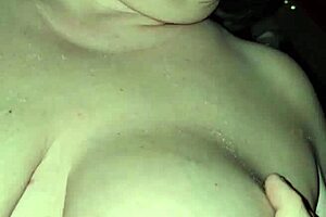 hey, check out this milf milking her big tits while riding that cock