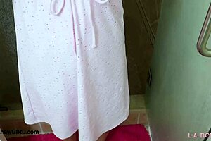 Pretty Asian teen takes a refreshing shower after casting.