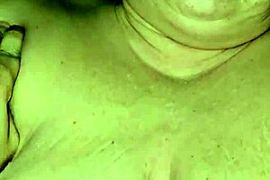 hey, check out this milf milking her big tits while riding that cock