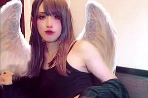 Cute Japanese Shemale Masturbates While Streaming