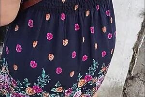 Following mature woman in skirt and thong on street