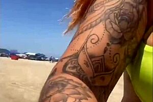 African woman flashes big pussy on beach