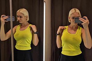 curvy blonde with big tits tries on sexy see-through outfit in changing room