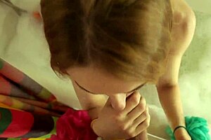 Beautiful milf invited me to the bathroom, took my cock in her hand, and started sucking