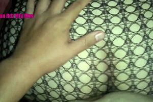 indulge in fishnet-clad feet and big tits for a tantalizing footjob experience with bbw milf