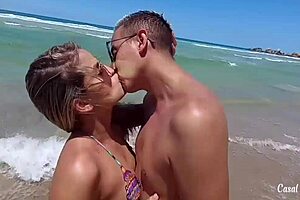 enjoying nudist beach activities with wife