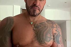 Viktor Rom in intriguing tattooed gay daddy bear scene