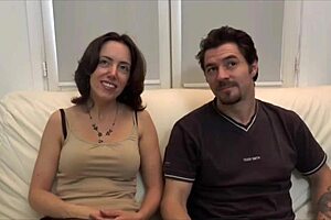 passionate encounter with a very alluring brunette in an intimate bedroom scene