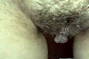 New video - she gets pissed on and is very hairy