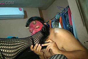 indulge in fishnet-clad feet and big tits for a tantalizing footjob experience with bbw milf