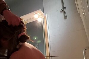 Female slave undergoes dressage training with the badine