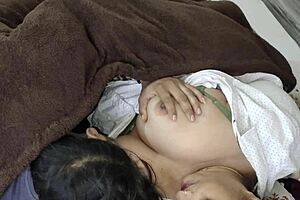 Big Tits Indian Woman Shares Bed with Young Guy at Home