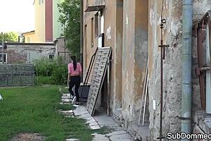 Why is the babe tugging the sub's cock after tying him up?