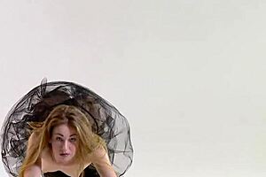 Blonde Gymnast Stretches Nude Acrobatically