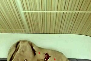 Cute coworker receives cum in her socks during intimate office encounter