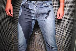 Guy pees inside his jeans and delivers a cumshot on the end!