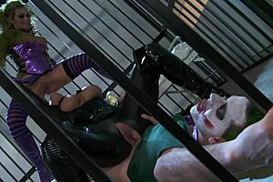 Catwoman gets a wild threesome in the cage with anal and blowjob