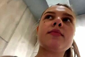 In the crowded public gym, a young bbw with big natural tits cums hard from fingering