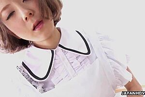 Japanese maid intensely fingers her trimmed pussy in bed uncensored.