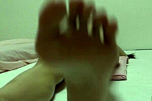 Skinny Japanese babe shows off her cameltoe in a micro bikini g-string wedgie.