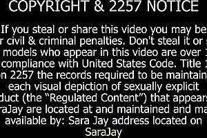 Sara Jay fucks busty Kelly Staxxx with strap-on