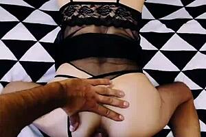 A wife in erotic fishnet spreads legs beautifully