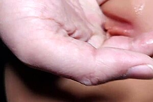 Picking at her pussy while practicing with fuck doll in double penetration.