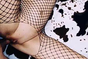 A wife in erotic fishnet spreads legs beautifully