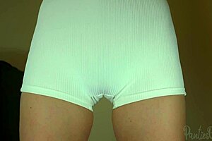 look at this blonde flashing her huge hairy pussy in shorts