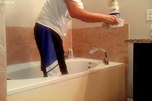 tidying up the bathroom during house chores