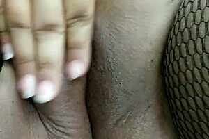 beruka teases voluptuous curves in open fishnet pantyhose