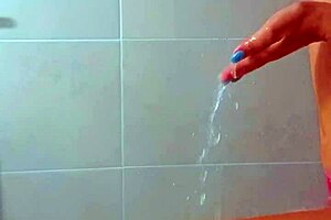 Tanned Latina beauties rinse off beach sand in steamy shower