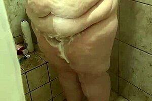 curvy bbw wife sneaks a wash in the shower before getting caught