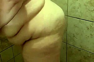 curvy bbw wife sneaks a wash in the shower before getting caught