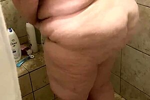 curvy bbw wife sneaks a wash in the shower before getting caught