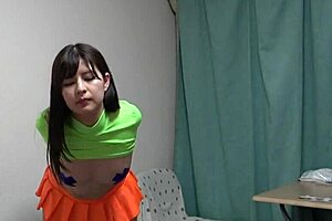 seductive japanese yuki slips out of lingerie into teasing miniskirt for webcam thrills