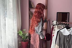 Skinny redhead nerd in stockings poses solo library style