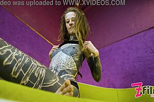 hey check this hippie tattoo teen stuffing her wet pussy with toys