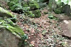 Shemale strokes glass dildo on road