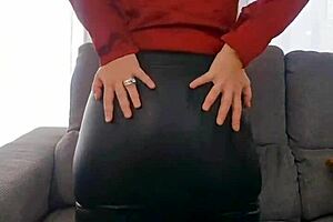 Mature milf's huge ass in leather skirt tempts your gaze