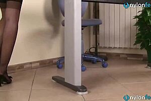 Redhead secretary teases feet in stockings pantyhose office play