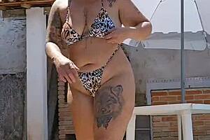 Wife flaunts tight bodysuit on her big ass while husband watches silently