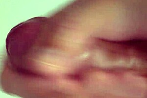 Close-Up View of Intense Solo Masturbation with Shaved Pussy Spreading Wide