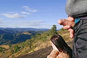 Tourist guide flashes monster cock at curvy tourist on mountain trail outdoors