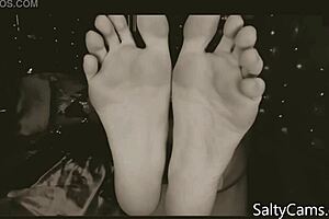 Teasing foot lover indulges in gentle toe worship